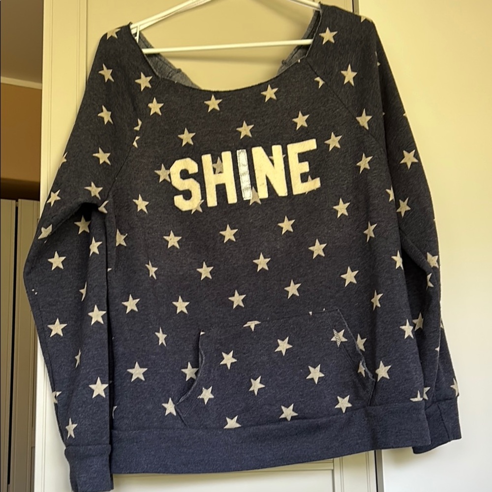 Off the Shoulder Navy Star Pattern Sweatshirt with Shine Text.